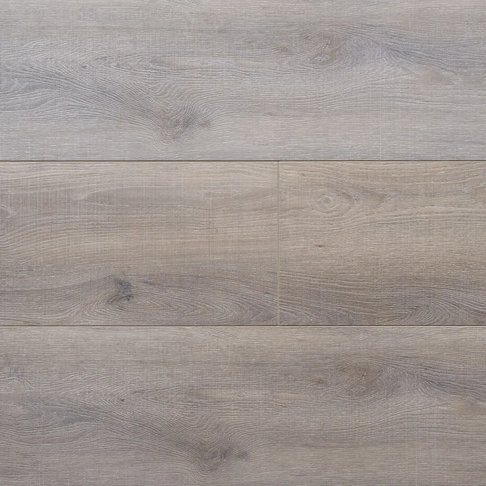 King Canyon Oak Artisan Hardwood Innova King Canyon Oak waterproof SPC vinyl plank flooring in a soft gray wire-brushed oak tone, close-up
